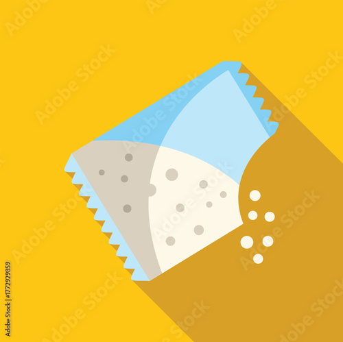 Small open sachet pouring sugar or salt on yellow background with long shadow
