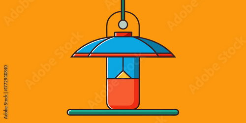 Colorful bird feeder made from recycled soda bottle with bright background  