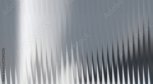 Abstract silver background with texture. The lines have a gradient effect and form sharp angles 