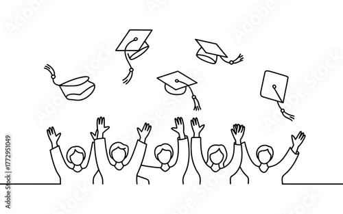 Graduates celebrate with caps tossed in the air, a moment of pure joy and achievement.