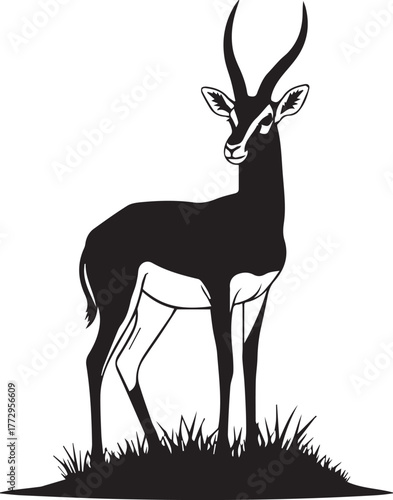 Elegant black silhouette of a majestic gazelle standing gracefully on grassy ground