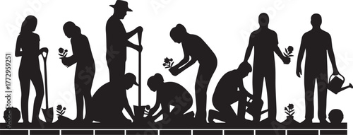 Diverse group of volunteers working together planting flowers for international volunteer day celebration