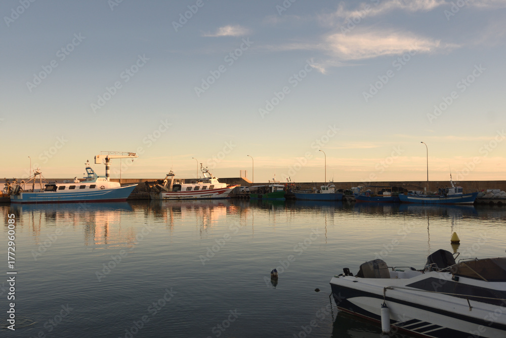Fototapeta premium sunset at Fishing port of Les Cases de Alcanar, Tarragona province, Catalonia, Spain