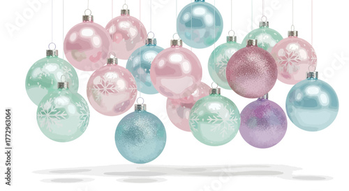 A collection of pastel-colored Christmas ornaments hangs suspended against a white background.