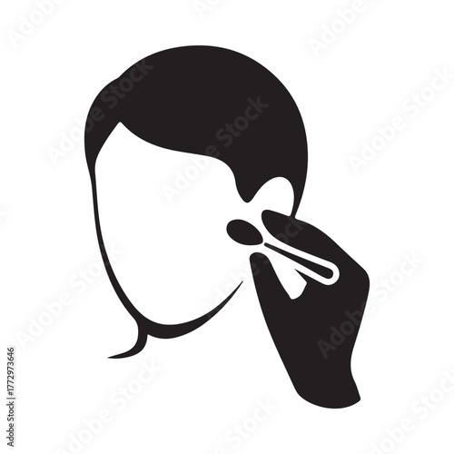 Person applying makeup with a brush to their face