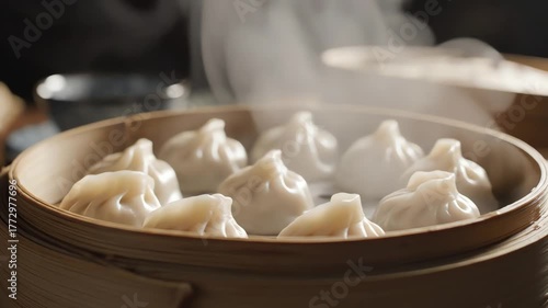 Steaming Hot Traditional Dumplings in a Bamboo Steamer Basket.