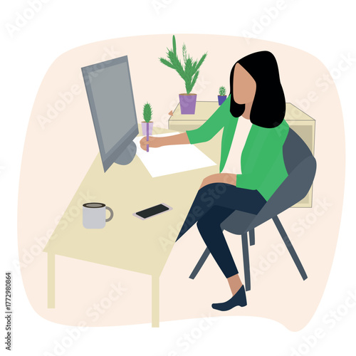 A girl sits in a comfortable office, working on a computer.
