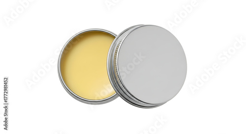 Open metal tin with yellow balm and closed lid container