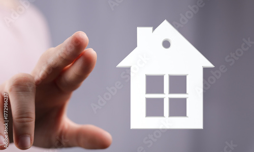 A hand is reaching out towa...