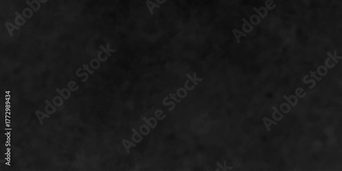 Distressed rough black cracked wall slate texture wall grunge backdrop smoke background. Stone concrete texture anthracite panorama. Old vintage charcoal night dark black stucco design.	