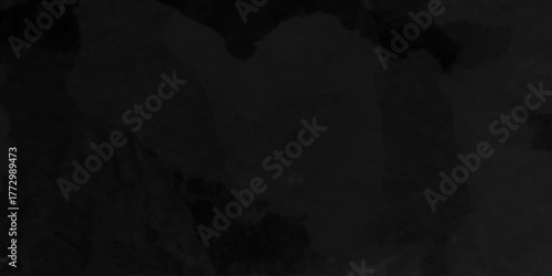 Distressed rough black cracked wall slate texture wall grunge backdrop smoke background. Stone concrete texture anthracite panorama. Old vintage charcoal night dark black stucco design.	