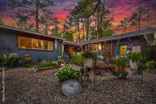 Photography A Charming Home Garden at Sunset with a Beautiful Vibrant Sky