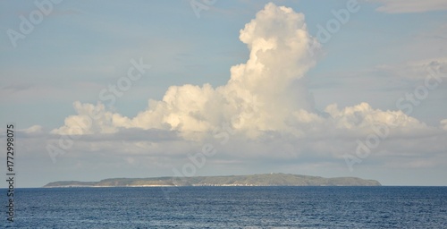 Susak island panoramic view from the sea. Island of northern Croatia made of sand with beautiful beaches. Island Susak on the horizon.