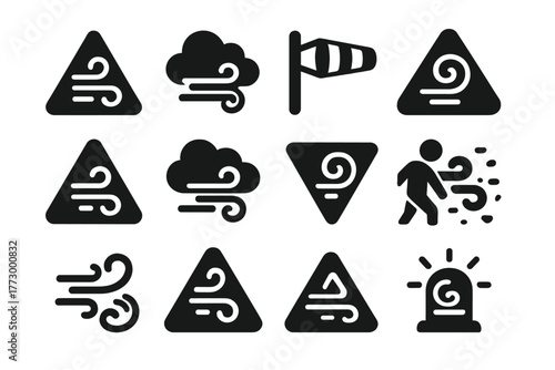 Wind Alert Icons. Solid style icons of wind-related alerts: wind advisory triangle, storm wind alert, gust warning icon, high wind