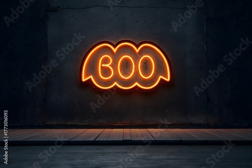 Neon “Boo” sign in dark room, glowing Halloween decoration