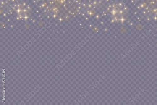 The light of gold dust, bokeh light effect background. Christmas glowing dust background, Yellow flickering glow with confetti bokeh light and particle motion. The dust sparks and golden stars shine.