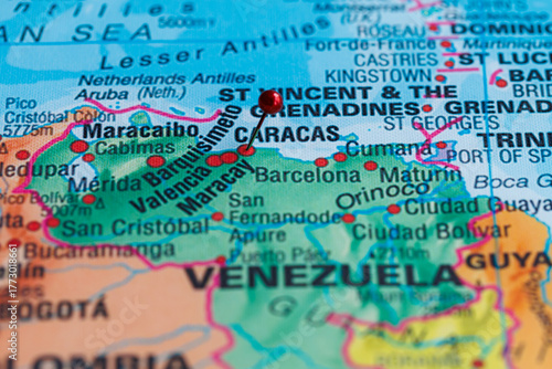 Capital of Venezuela, Caracas, is shown on world map with red pin.