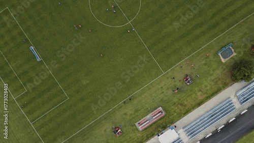 Drone shot from the Football Field in Pępowo - Training of Young Players and Turf Details - Dynamic Sports Action