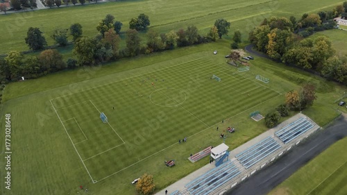 Drone shot from the Football Field in Pępowo - Training of Young Players and Turf Details - Dynamic Sports Action