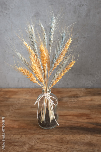 Decor with dried wheat in the national colors of Ukraine. Blue and yellow colors. Patriotic gift. Alternative to flowers. Gift with meaning. Interior decoration. Ukrainian flag.
