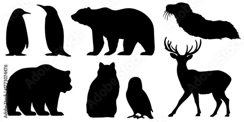Collection of diverse animal silhouettes including penguins bears deer and owl