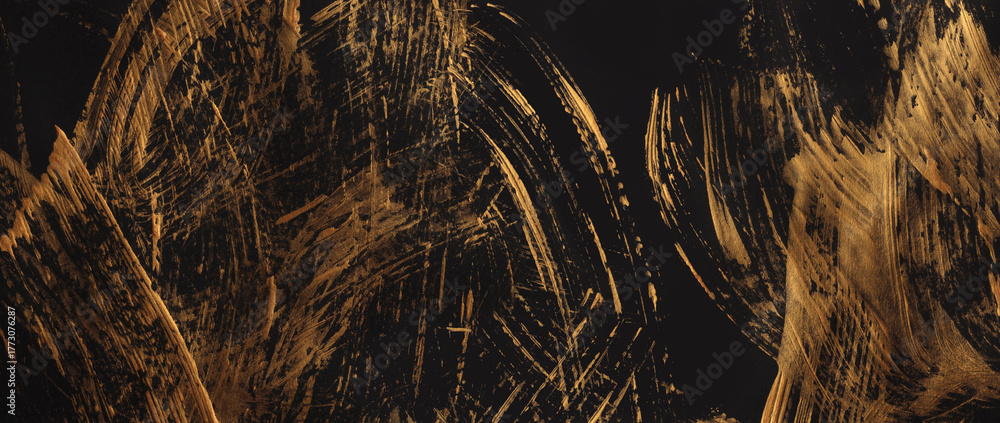 Obraz premium Gold glitter smear brush stroke blot painting paper. Abstract bronze, black color stain scratch grain texture background.