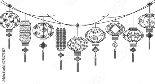 A string of decorative Asian lanterns with intricate patterns hangs against a white background.
