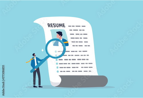Candidate resume review by HR human resources hiring manager, employment or searching for talent and new staff concept, smart businessman hiring manager using magnifying glass tor review resume.