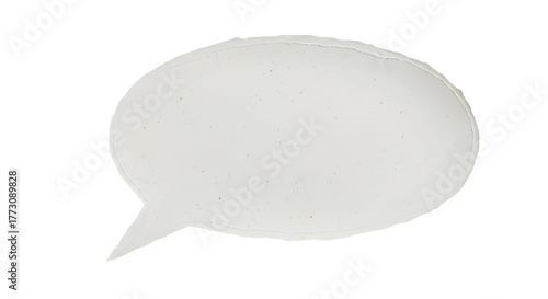 Isolated torn paper speech bubble with rough edges on a stark black background for communication concepts