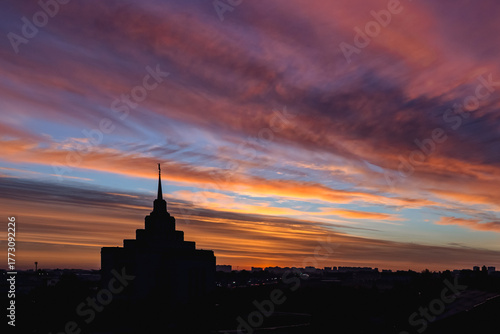 Skyline at sunrise. Colorful dawn. Sky of Ukraine. Mormon Church. European country. Megapolis Kyiv. Panorama of a big city. Sky gradient. Enchanting beauty of nature. Tourism in Europe. 