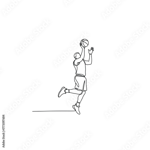 Basketball player jumping for a dunk silhouette