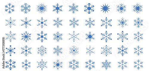 Stunning collection of diverse blue snowflakes elegantly arranged, perfect for festive winter designs and chilling seasonal promotions