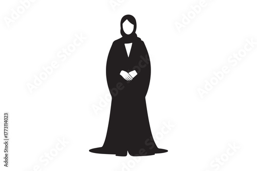 Elegant silhouette of a woman in a black abaya and hijab