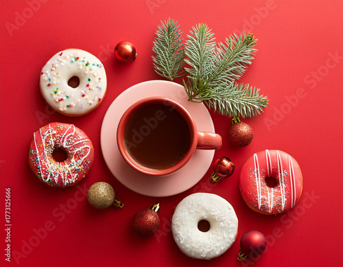 Creative concept photo of coffee cup with pastry and christmas decorations celebrating new year xmas holiday on red background.