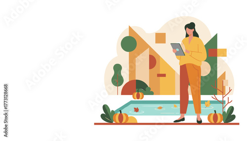 Modern woman using tablet in an abstract autumn park setting with pumpkins and fall colors