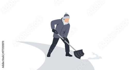 Man shoveling snow from driveway wearing winter clothing  