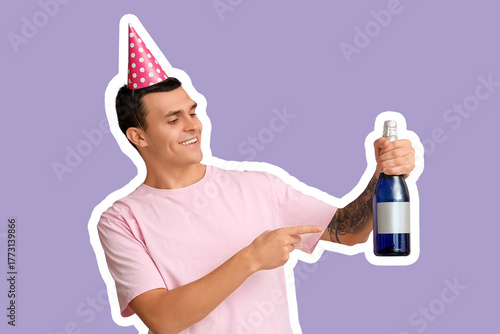 Young man in party hat with...