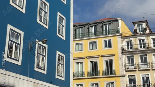 Architectural building in Lisbon, Portugal, with traditional tiles, pastel colors, and elegant details, representing the historic charm and urban beauty of Portuguese architecture.