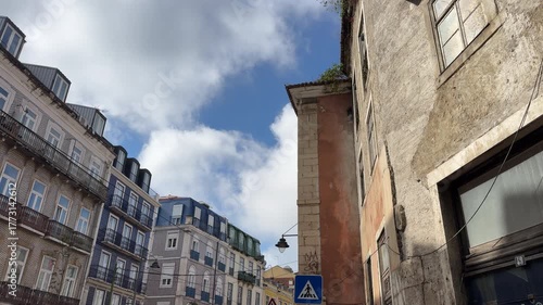 Architectural building in Lisbon, Portugal, with traditional tiles, pastel colors, and elegant details, representing the historic charm and urban beauty of Portuguese architecture.