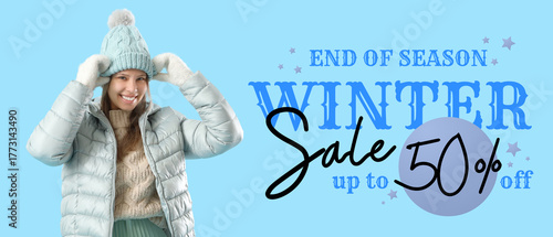 Happy young woman in winter...