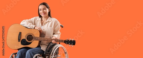 Young woman in wheelchair p...