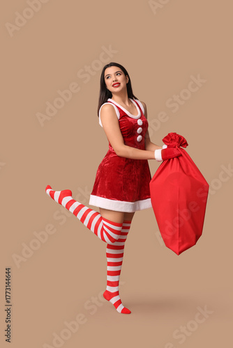 Pretty young woman dressed ...