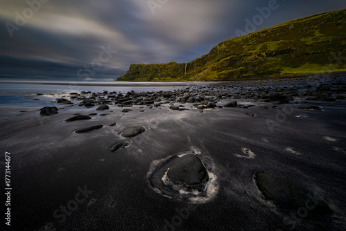 Wallpaper Mural Long exposure view of Talisker Bay, Isle of Skye, Scotland. Dark volcanic sand, smooth rocks, and moody light create a dramatic coastal landscape of the Scottish Highlands. Torontodigital.ca