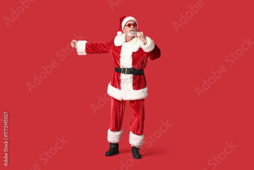 Santa Claus in sunglasses w...