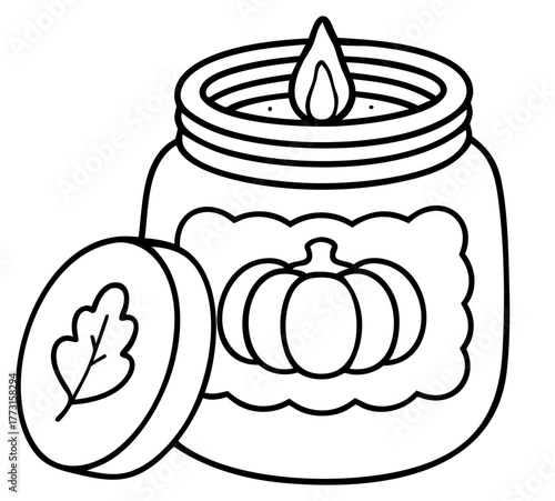 Pumpkin candle in glass jar with lid — cozy autumn home decor