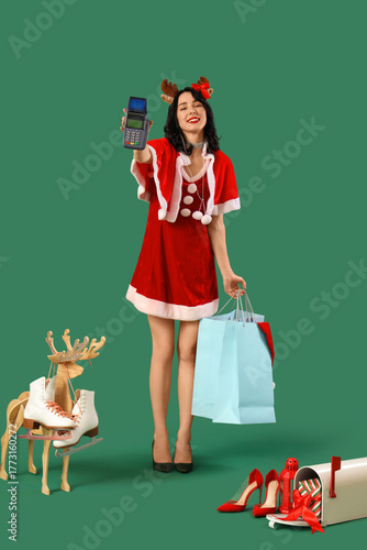 Pretty young woman in Santa...