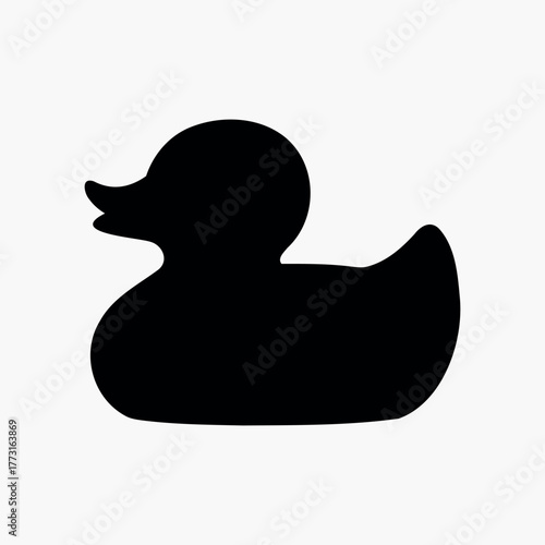 Black rubber duck silhouette icon vector flat illustration on white background. Bath toy duck icon. Concept of minimalism, bath toy, simple design.