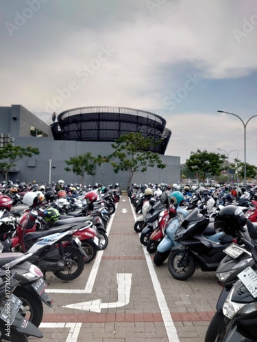 Motorcycles parked in a parking lot