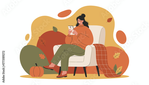 Cozy woman using smartphone in armchair Autumn digital communication relaxation and comfort at home