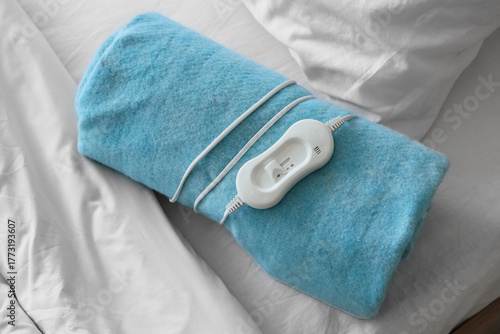 Folded electric heating pad...